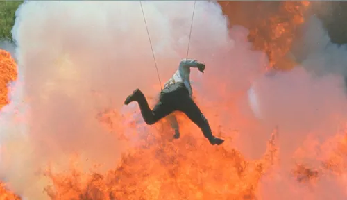 Performer suspended during a special effects sequence