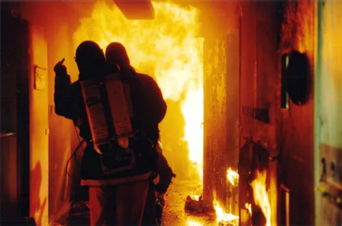 Crew working beside a controlled fire effect